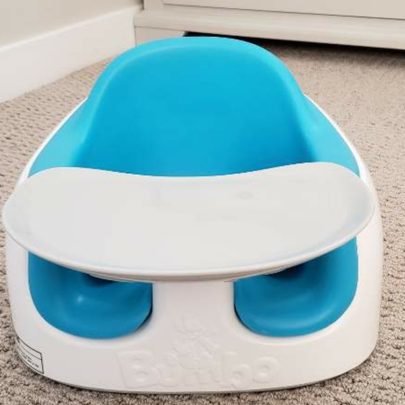blue bumbo with tray